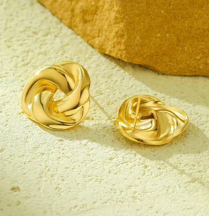 Gold round stud earrings