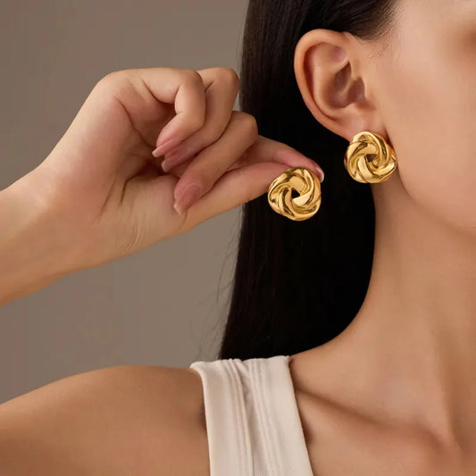 Gold round stud earrings
