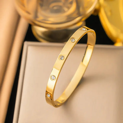 Crystal Studded Gold-Tone Hinged Bangle